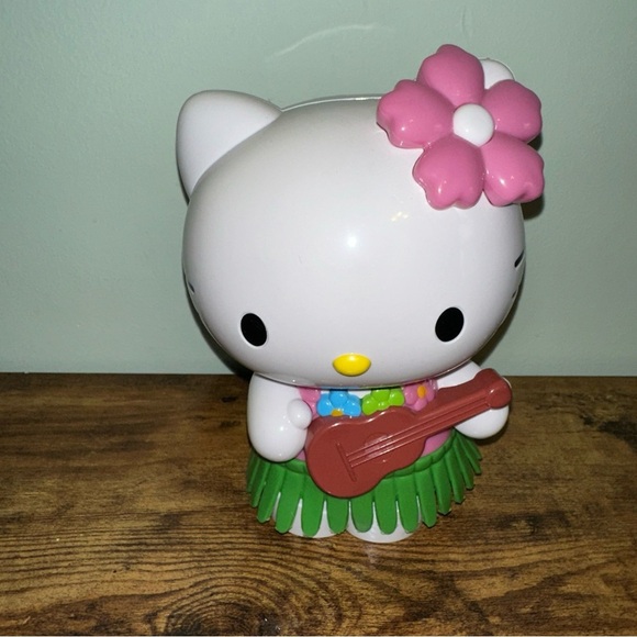 Hello Kitty Hula Action Figure with Pink Flower - Picture 1 of 3